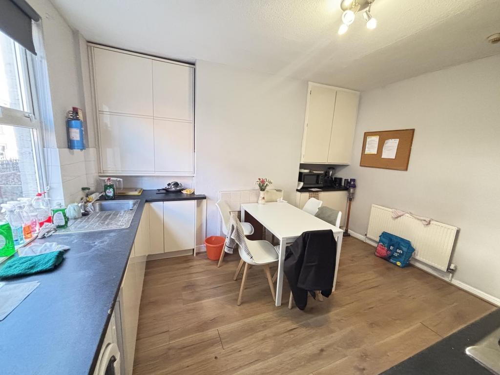 A bright and well-maintained kitchen featuring ...