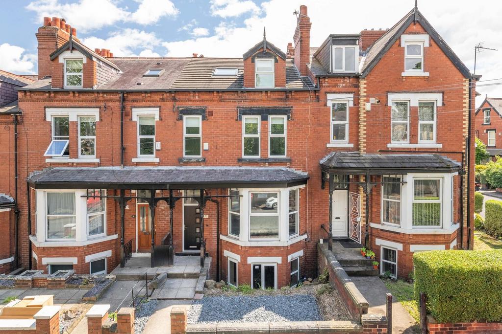 A classic terraced house with a well-maintained...