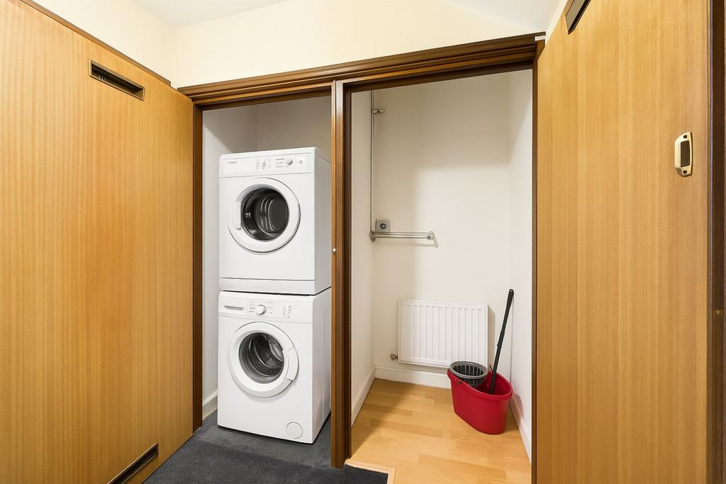 Neat Laundry Closet with Appliances