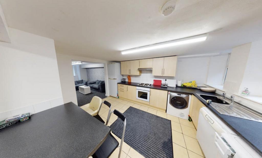 Bright and functional kitchen area with ample w...