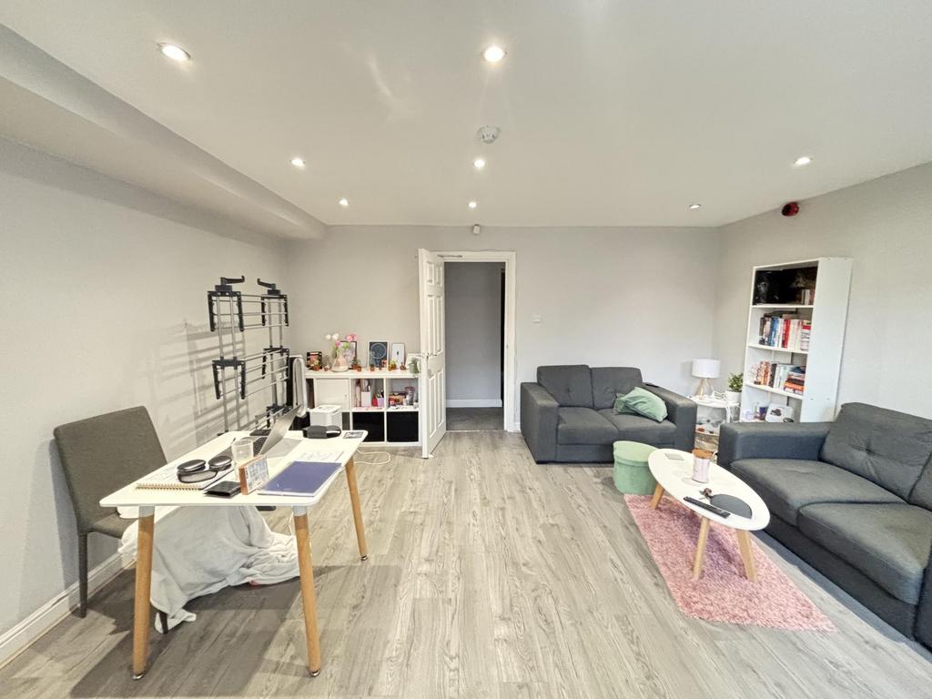 Bright and welcoming living room with modern fu...