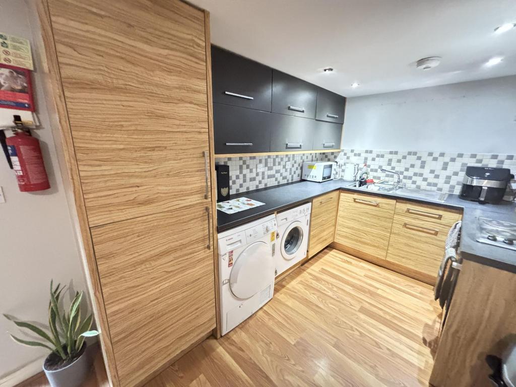 A modern, well-maintained kitchen featuring a m...