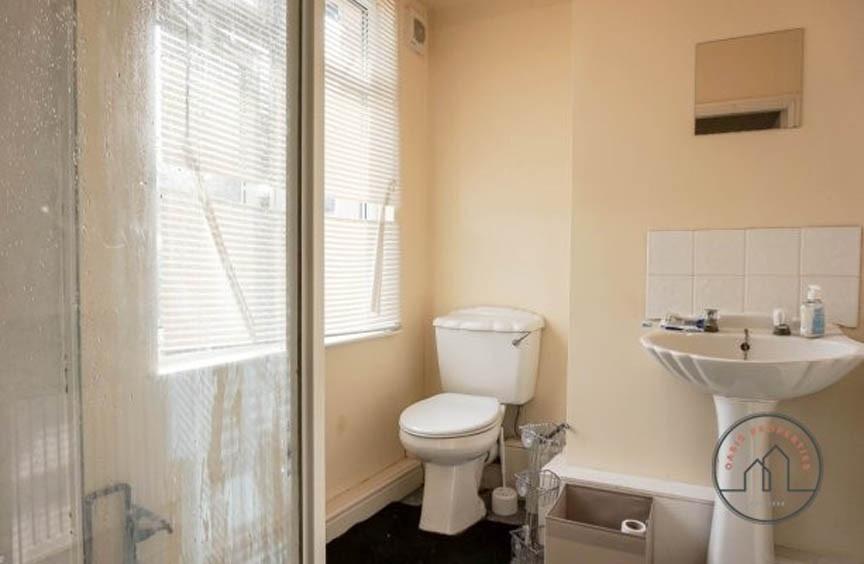 A bright and well-maintained bathroom featuring...