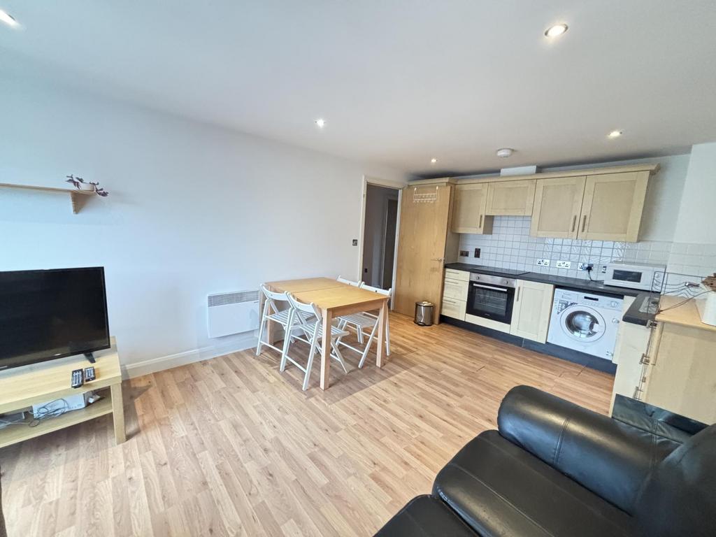 Bright and spacious living room featuring moder...