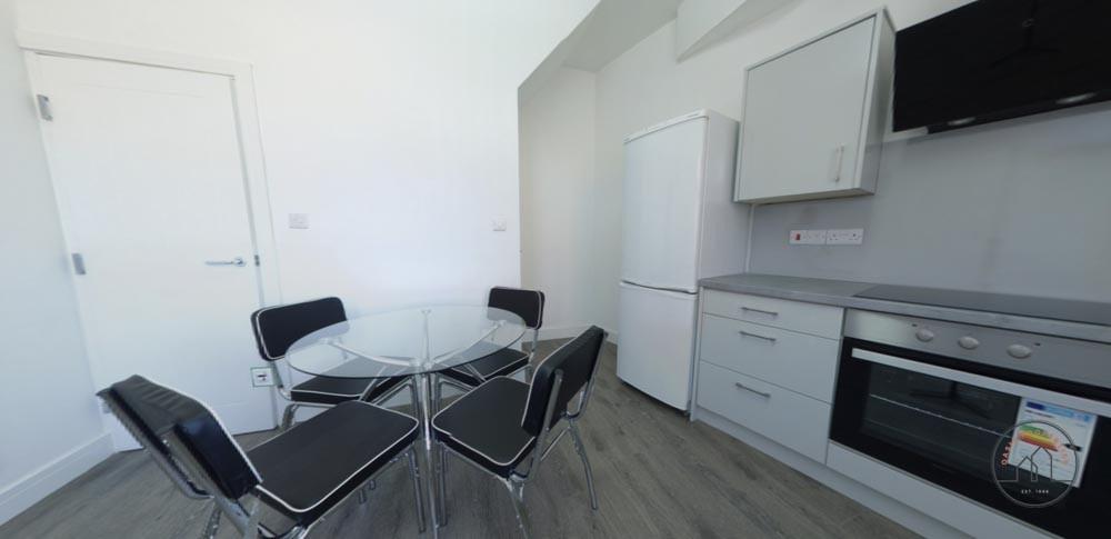 A modern, well-maintained kitchen area featurin...