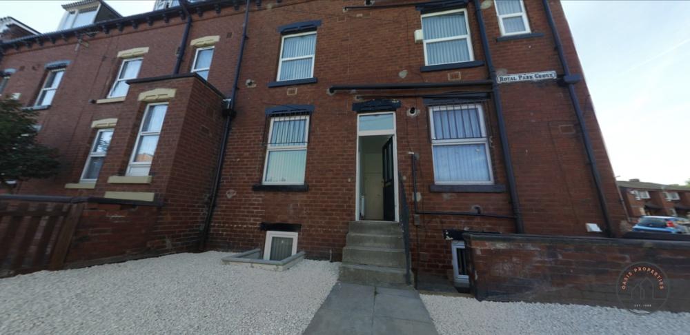 A clear exterior view of a traditional brick re...