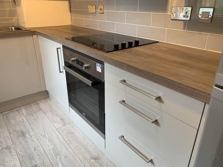 A modern, well-maintained kitchen featuring a s...