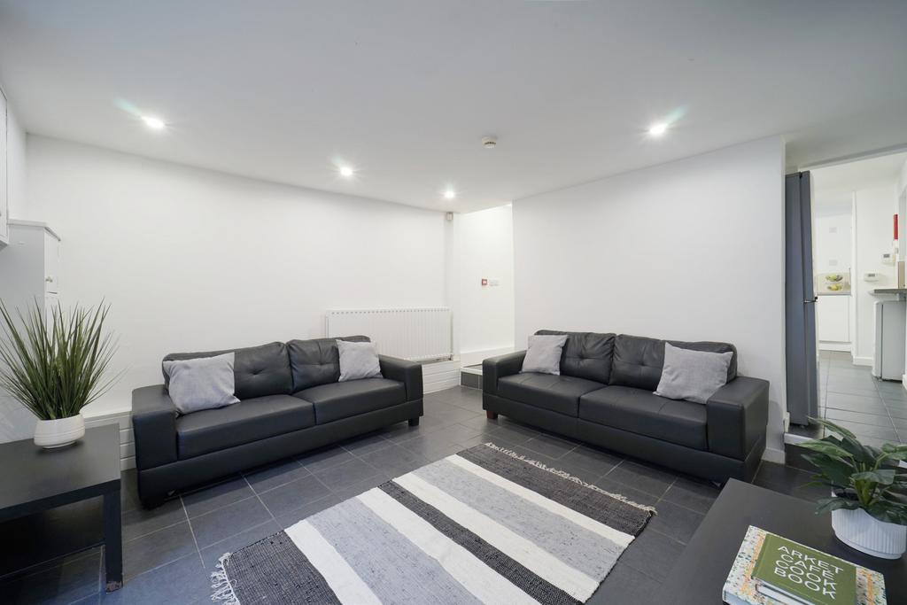 Bright and modern living room with contemporary...