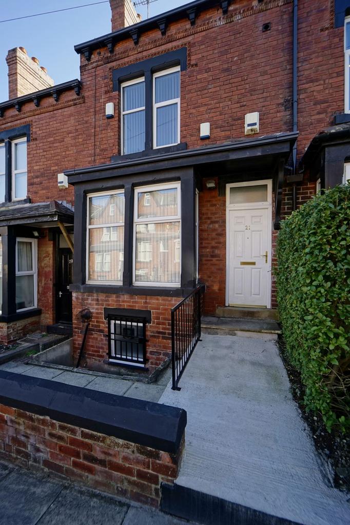 A charming brick-front residential building wit...