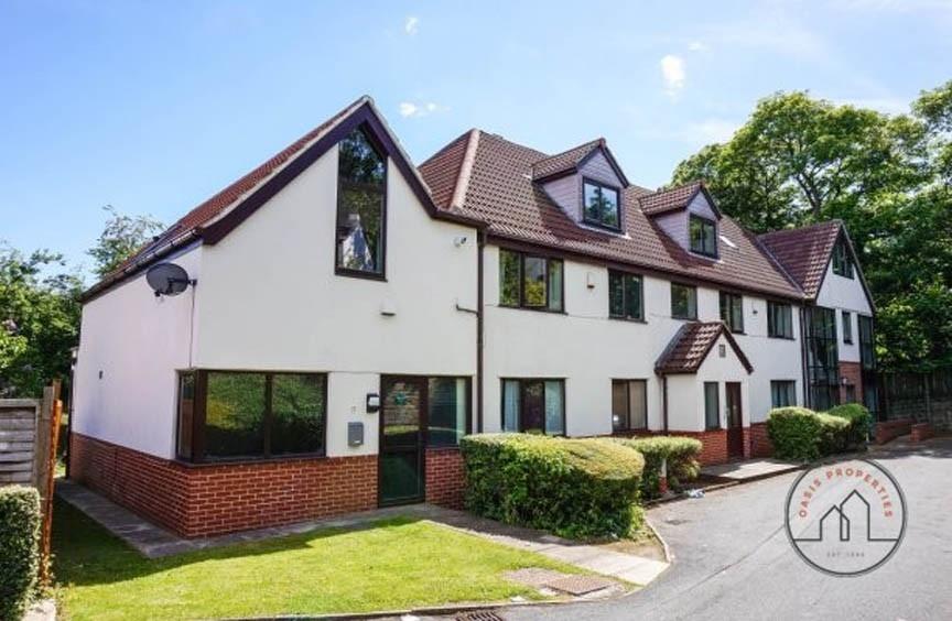 A welcoming exterior shot of a charming residen...