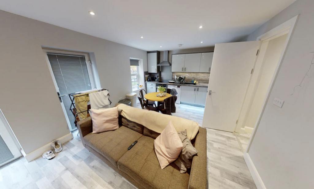 Spacious and bright living room with modern fur...