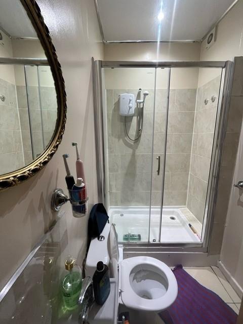 A clean and well-maintained bathroom featuring ...