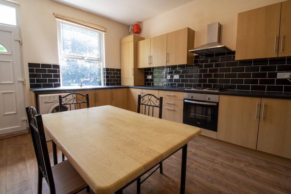 A bright and well-maintained kitchen featuring ...