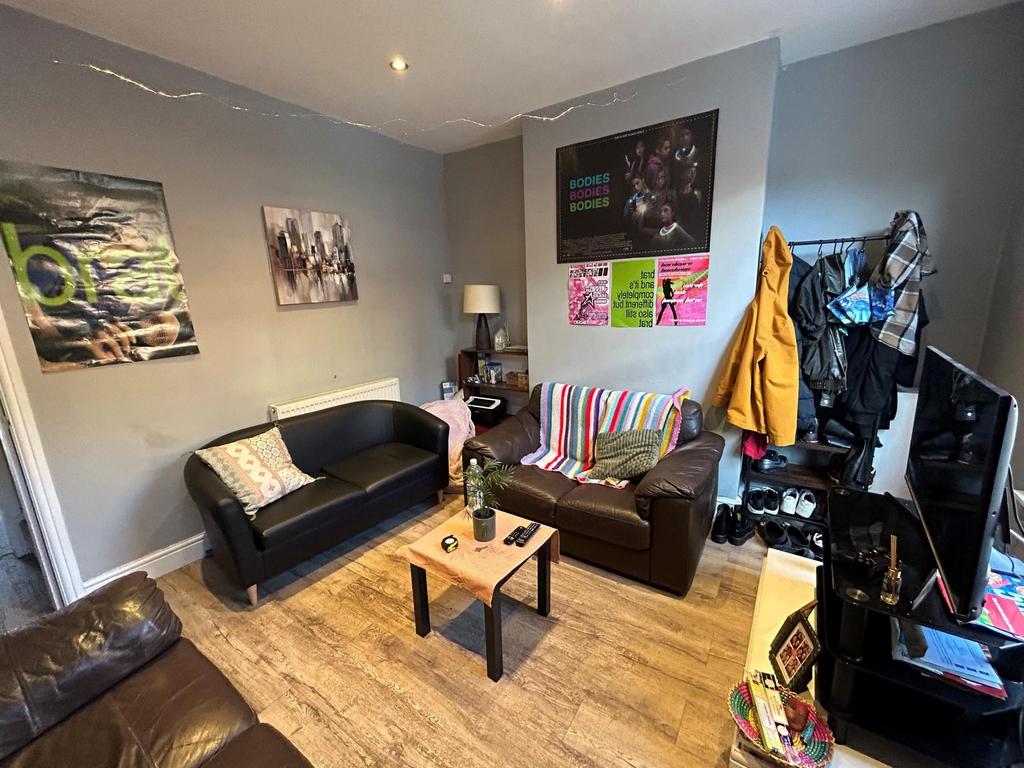 A welcoming and contemporary living room with c...