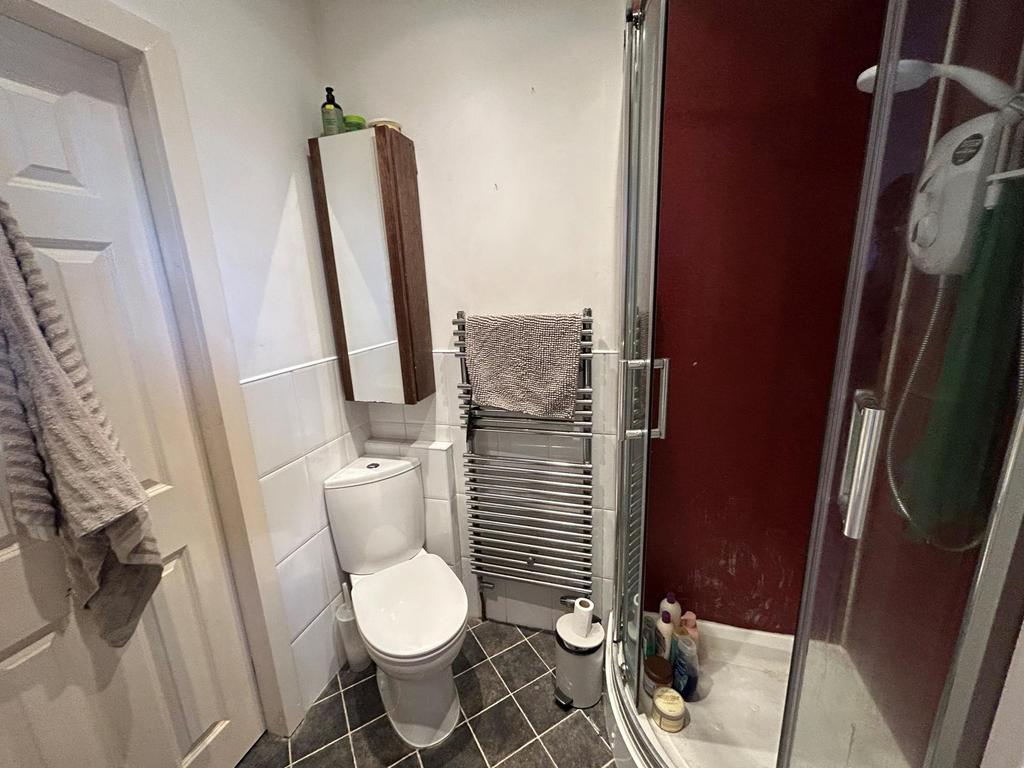 A clean and modern bathroom with a large bath, ...