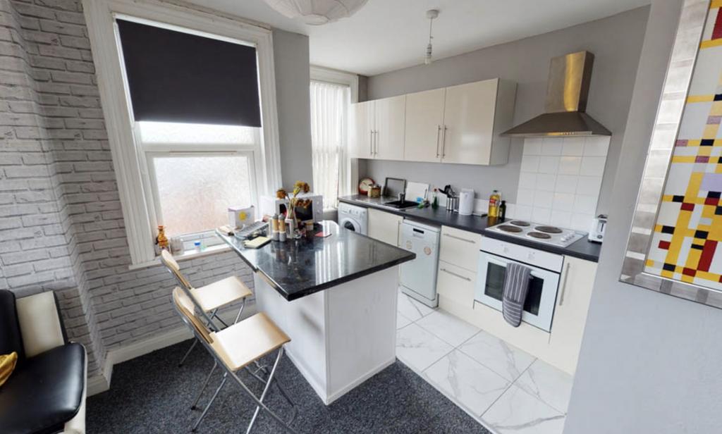 Modern and well-organized kitchen featuring amp...