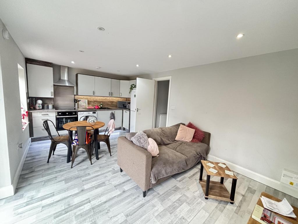 Bright and spacious living room with modern dec...