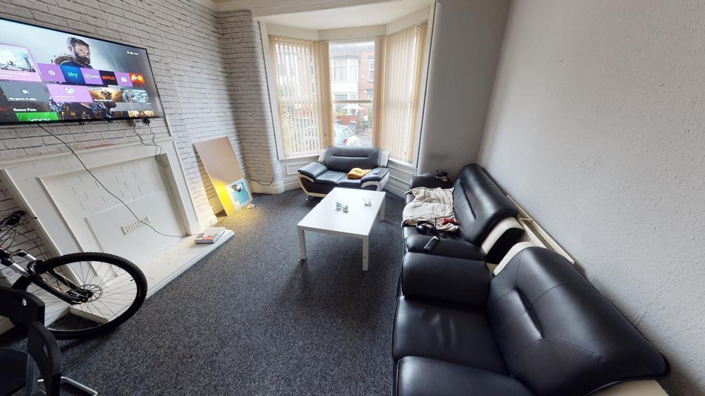 A bright and welcoming living room with a moder...