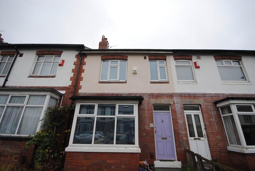 A charming view of the front exterior of a resi...