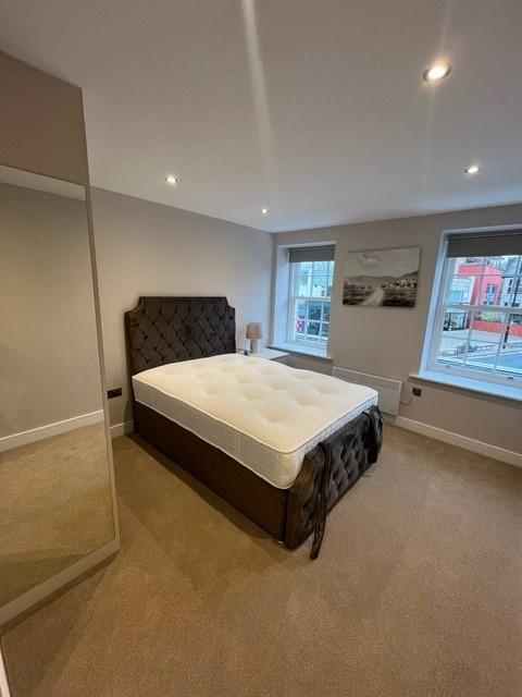 A spacious and well-maintained master bedroom f...