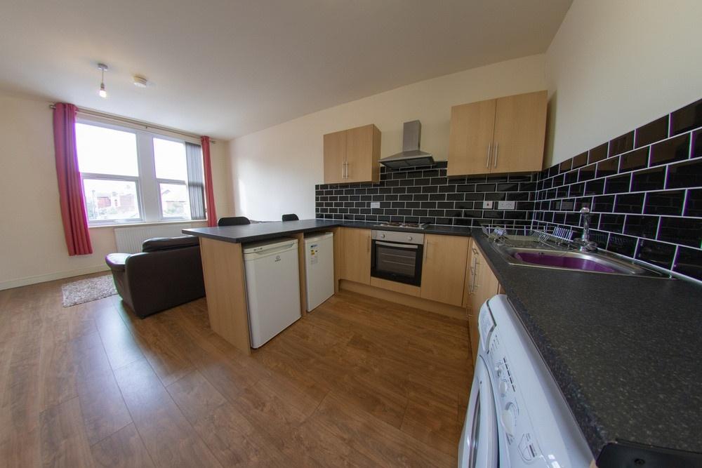 Modern kitchen with ample counter space, black ...