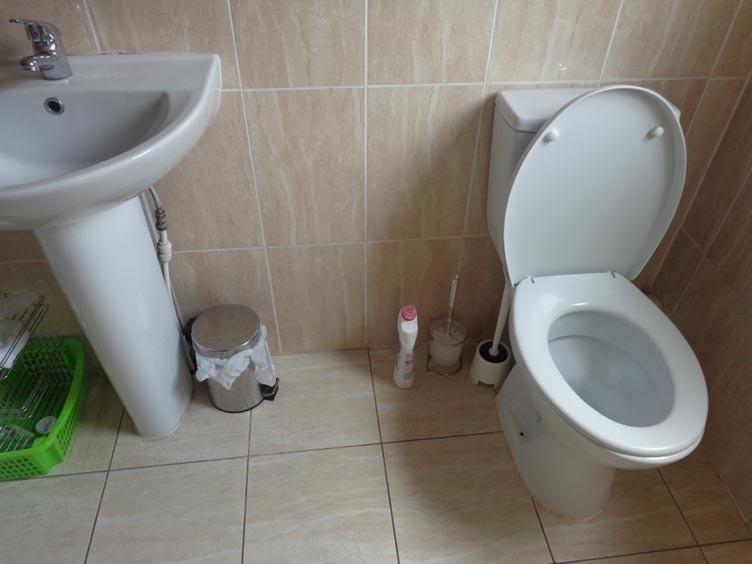 A clean and well-maintained bathroom featuring ...