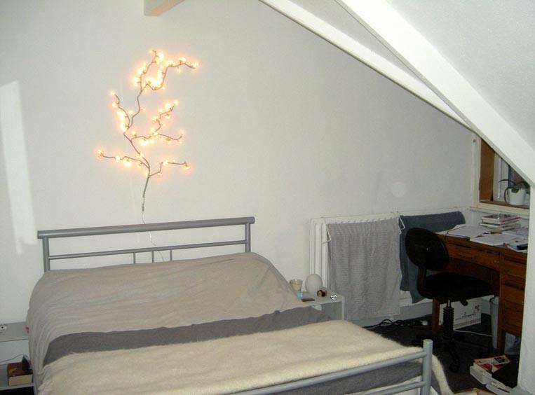 A spacious and inviting master bedroom featurin...