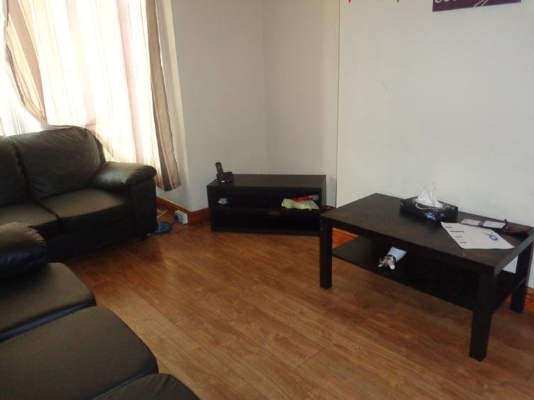 A comfortable living room featuring two sofas, ...