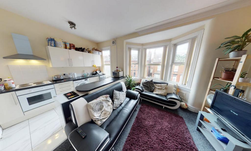 Bright and welcoming living room filled with na...