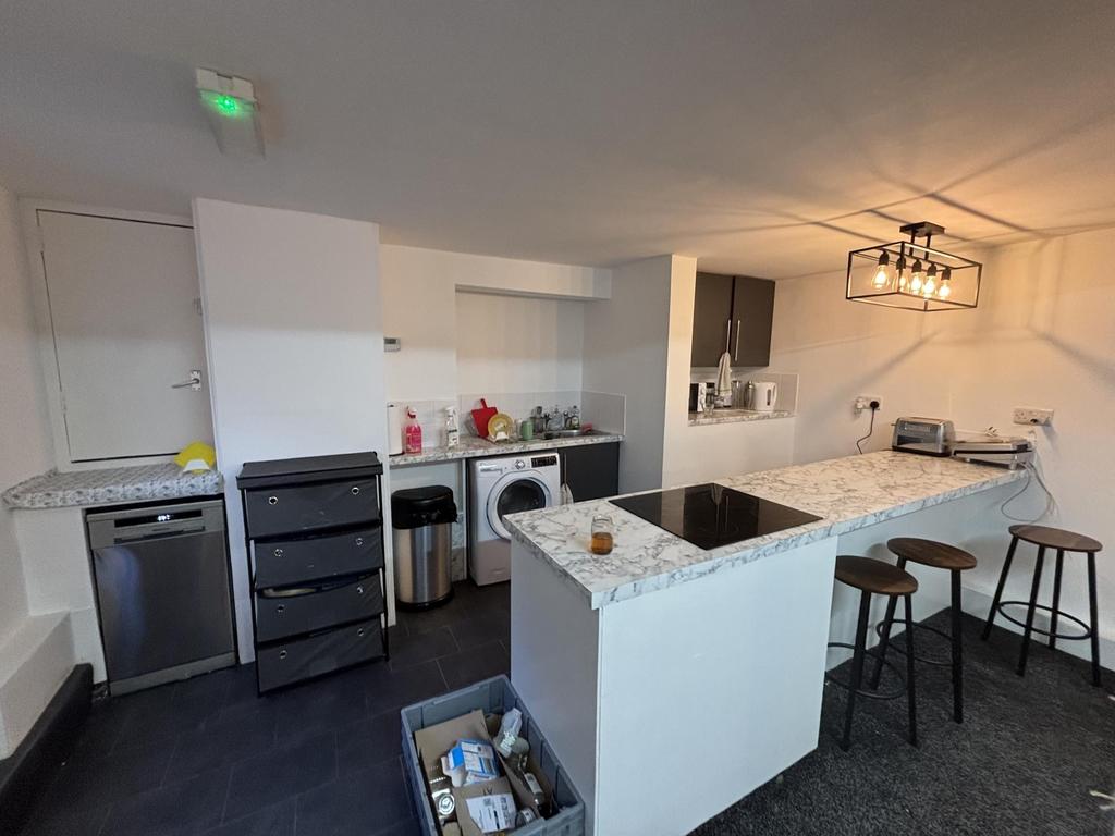 Modern kitchen with ample counter space and a c...
