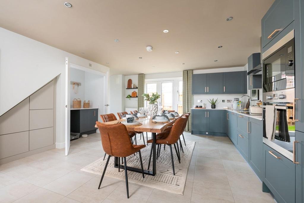A spacious kitchen area with French doors...