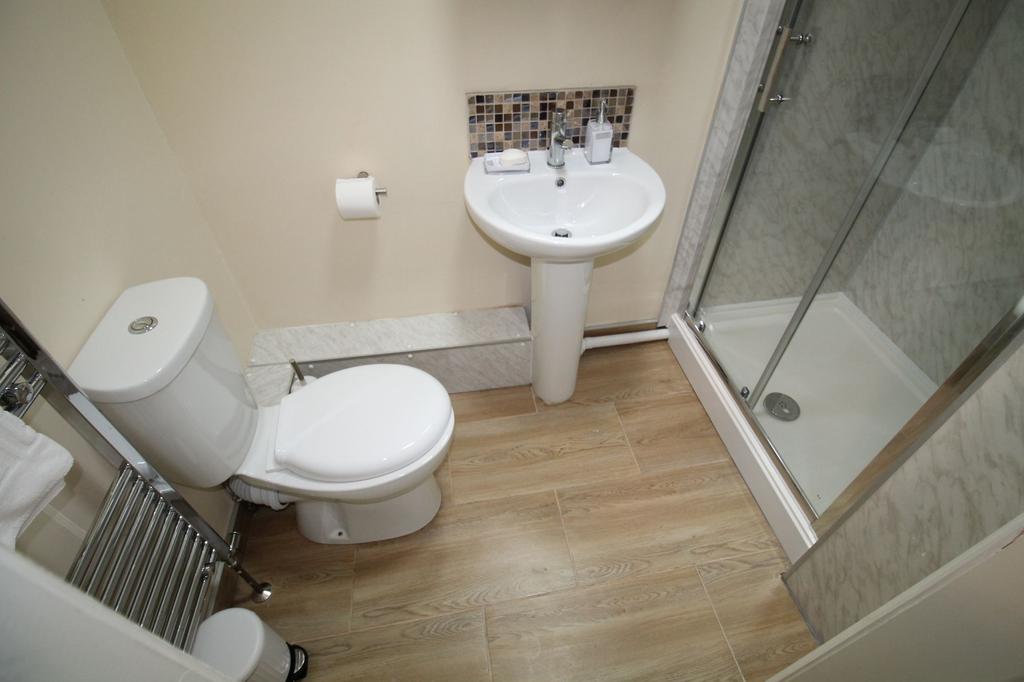 Well-presented bathroom with a modern pedestal ...
