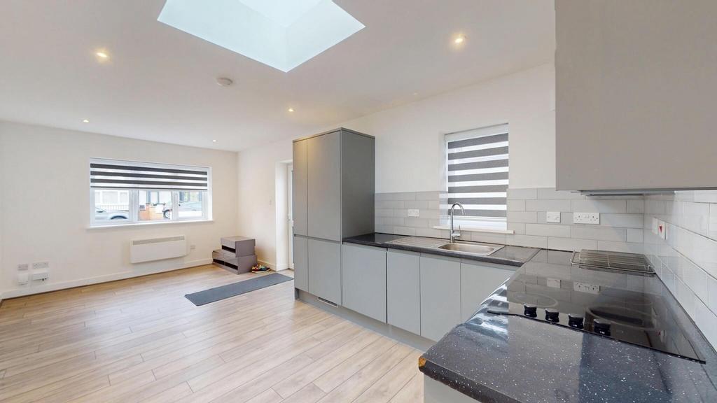 Bright modern open-plan kitchen and living area...