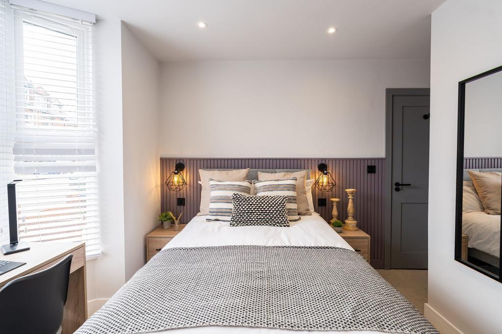 Bright and inviting master bedroom featuring a ...