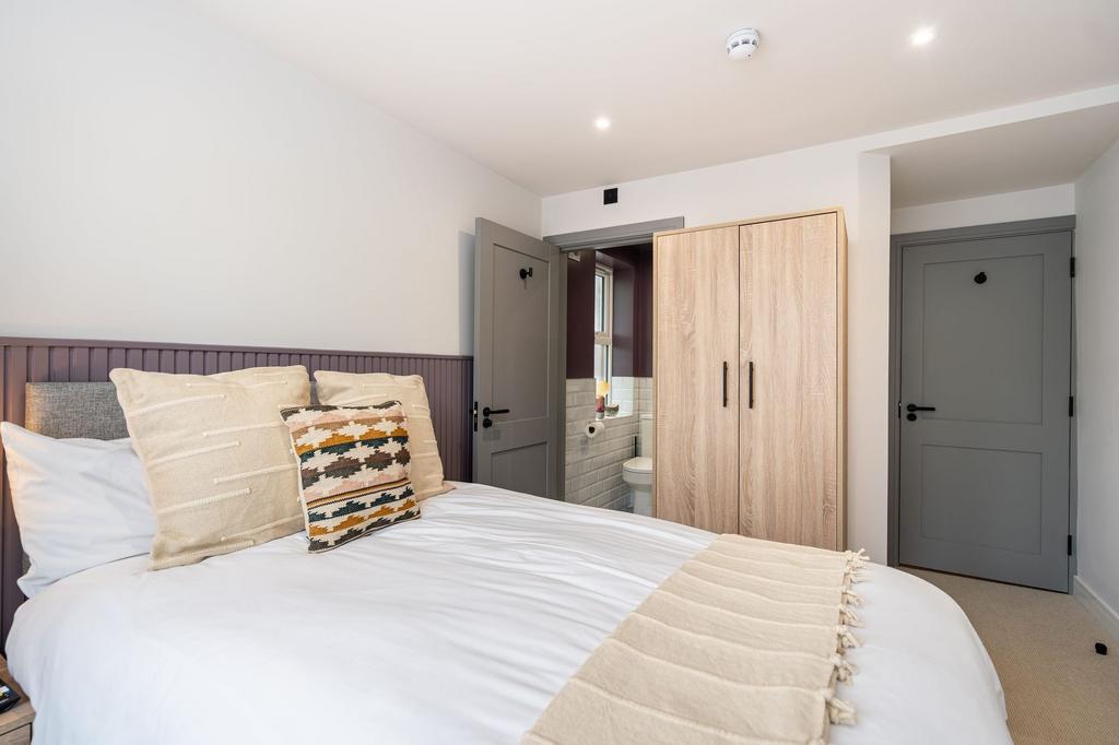 Bright and welcoming spacious master bedroom fe...