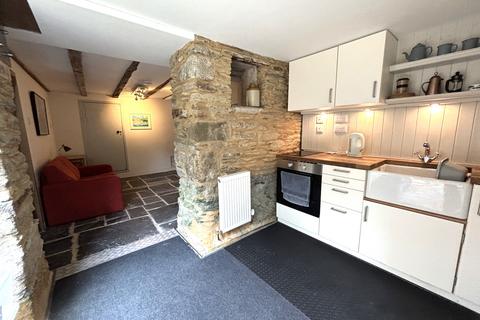 Basement, 5 Trafalgar Square, Fowey, PL23 1AZ