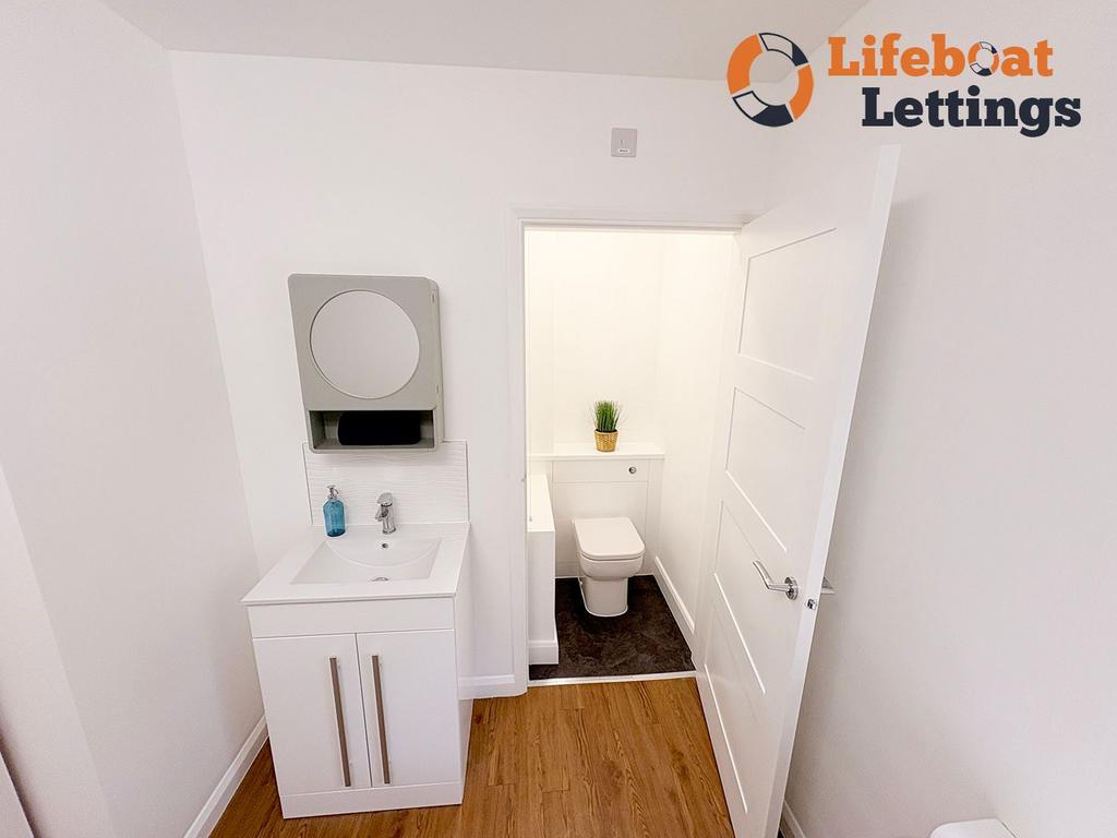 Double bedroom toilet and sink