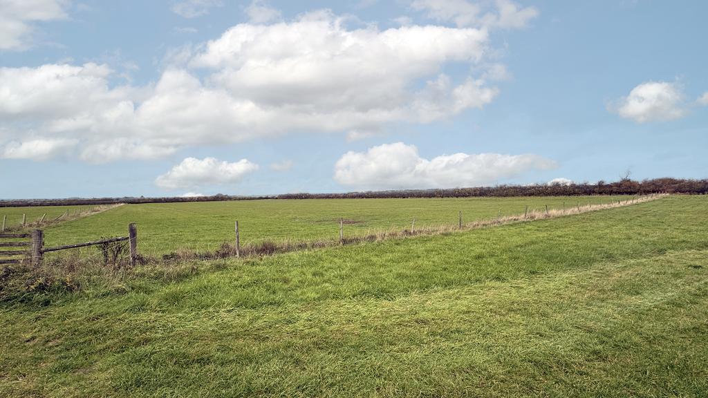 7 acres of pasture land with well-defined...