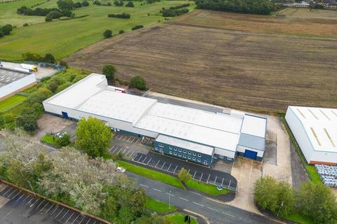 Distribution warehouse to rent, Lockett Rd Wigan WN4 8DE