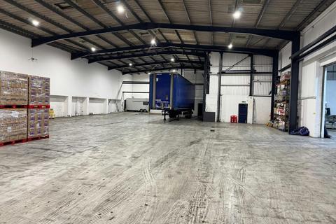 Distribution warehouse to rent, Lockett Rd Wigan WN4 8DE