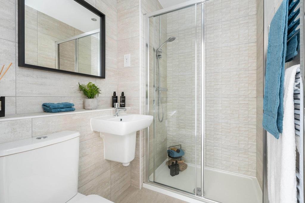Bedroom 1 also features a private en suite...