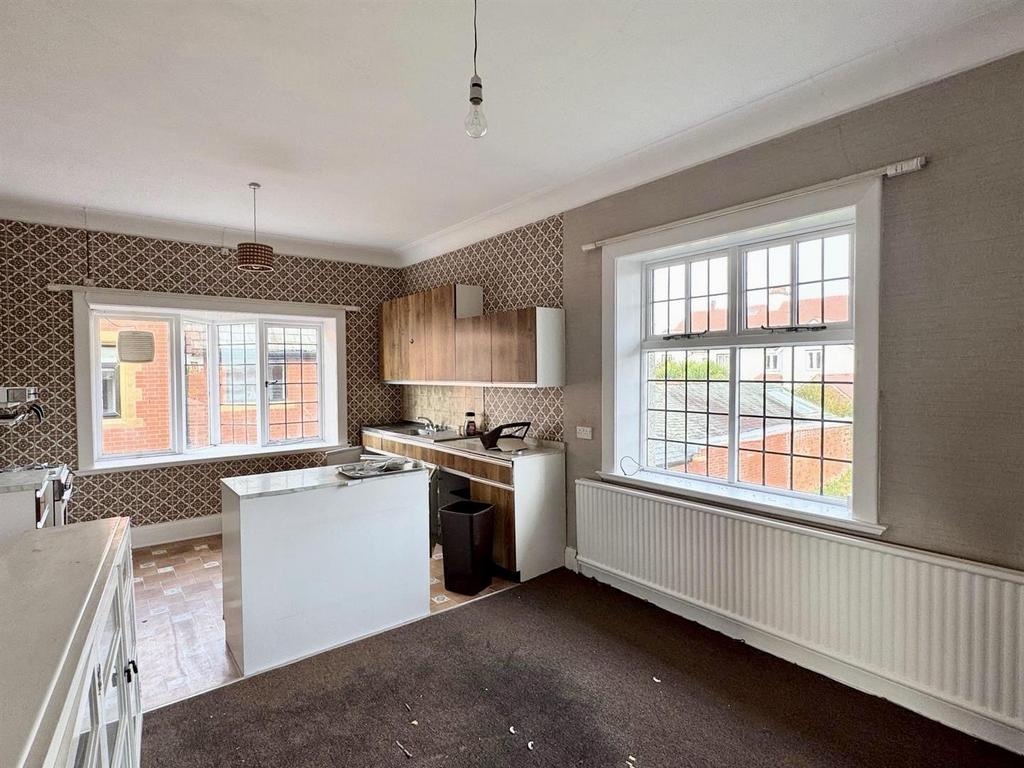 Bedroom three (current kitchen)
