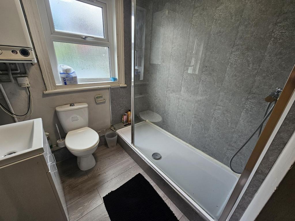 Modern bathroom with a full-size shower-bath, c...