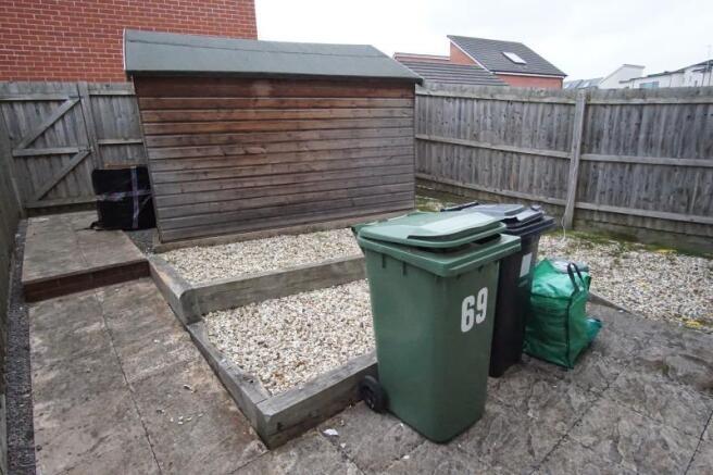 Low-maintenance paved and gravel private garden...