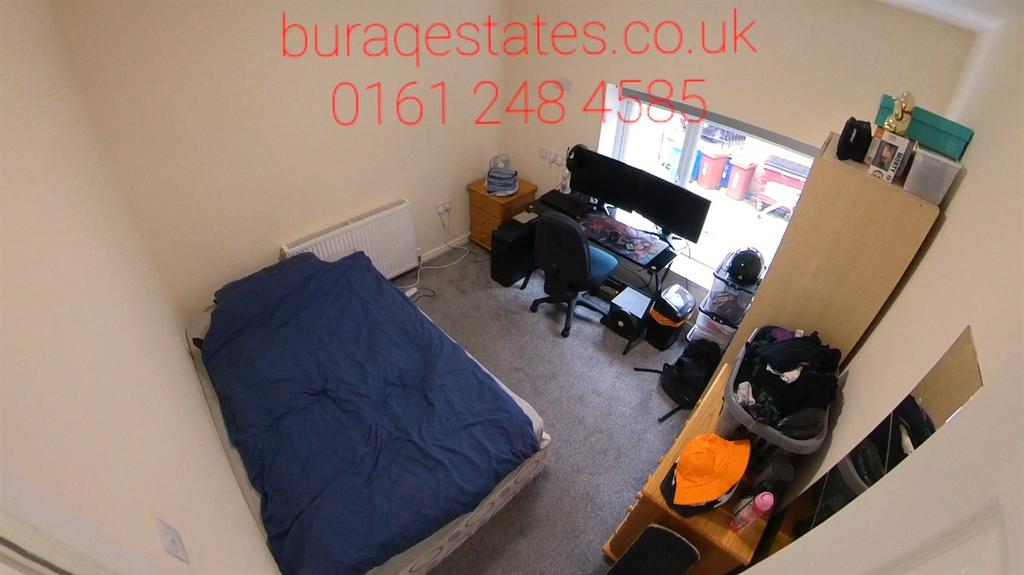 Well-presented furnished bedroom with a double ...