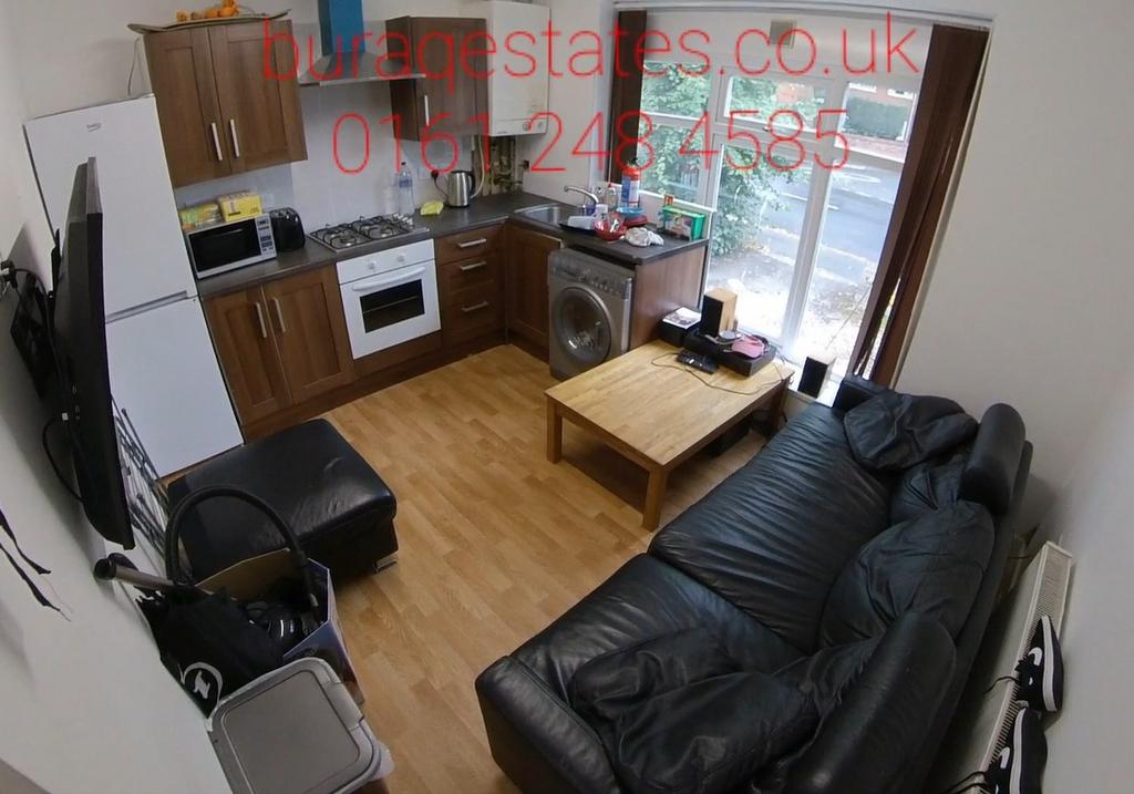 Well-presented open-plan living area with a com...