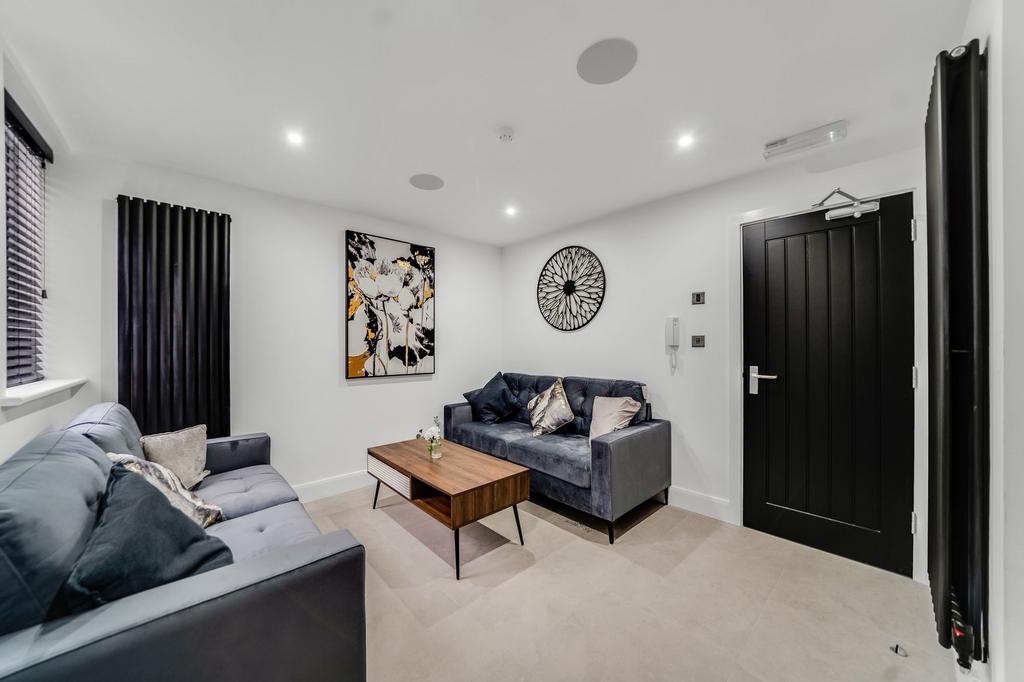 Bright and contemporary living room with stylis...