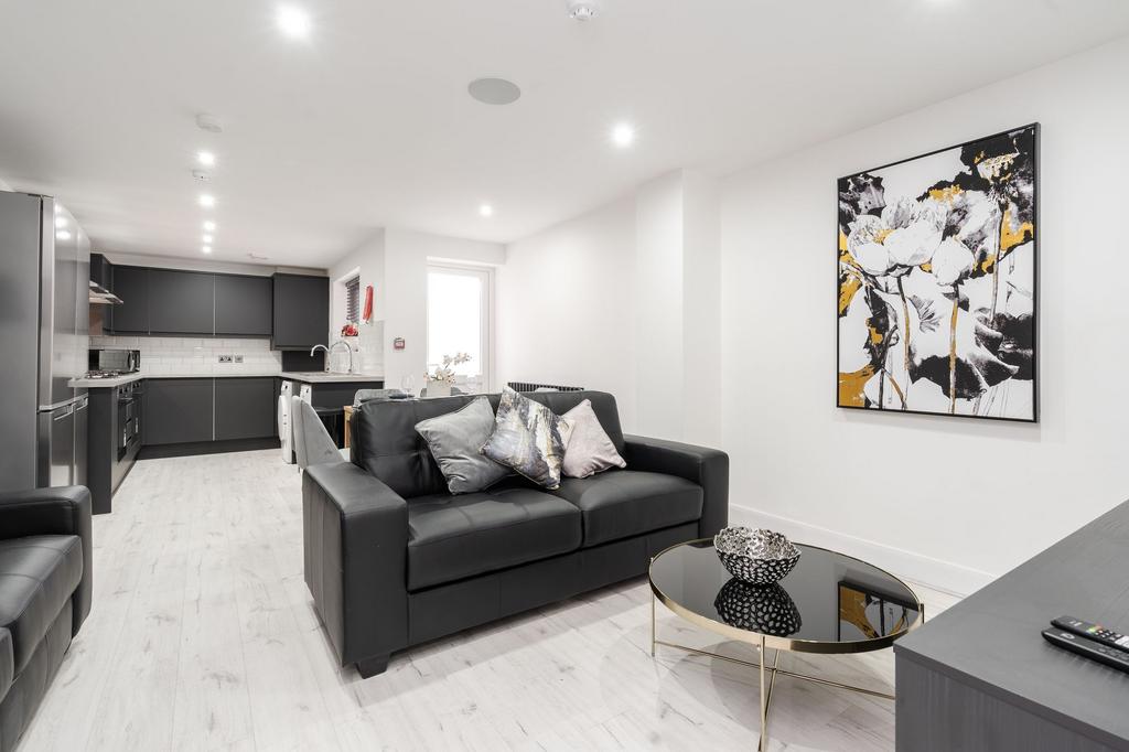 Modern and stylish living room with a sleek bla...