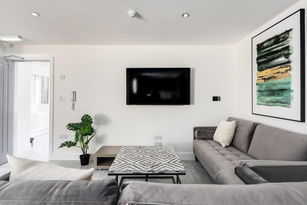 Modern and spacious living room with contempora...