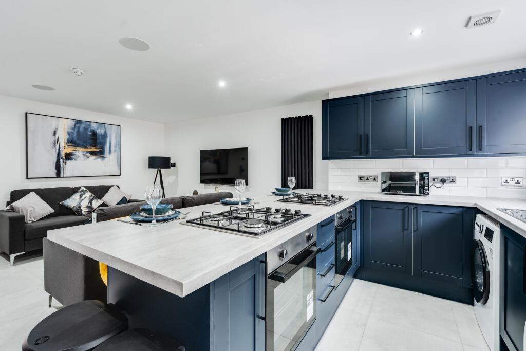 A contemporary living room featuring modern fur...
